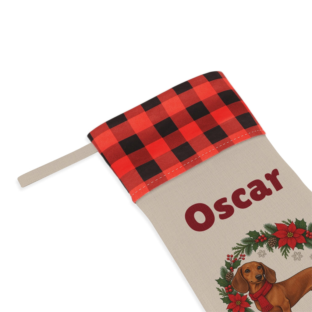Close-up of the printed name Oscar under the red plaid cuff