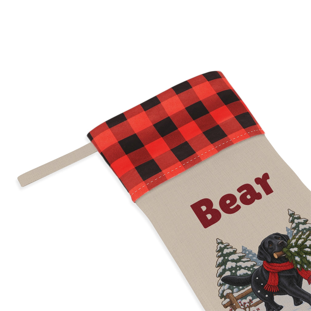 Close-up of the printed name Bear under the red plaid cuff