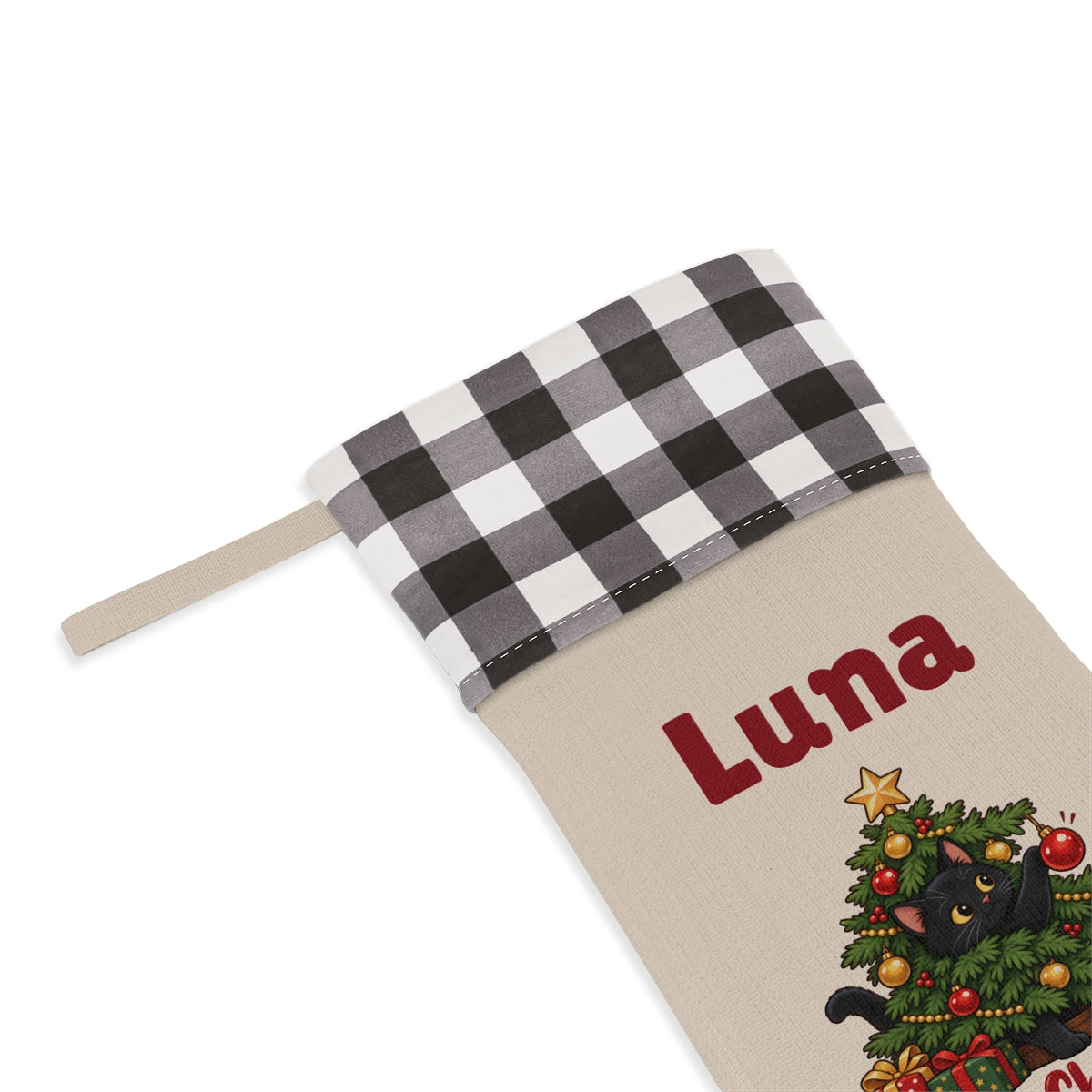 Close-up of the name under the white plaid cuff