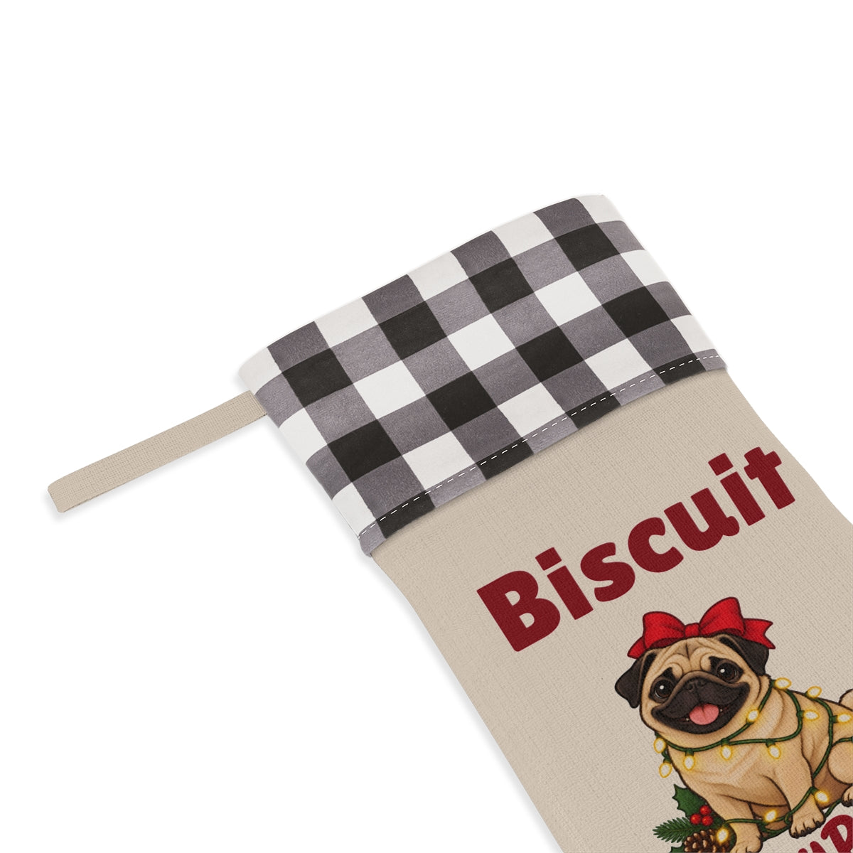 Close-up of the name under the white plaid cuff