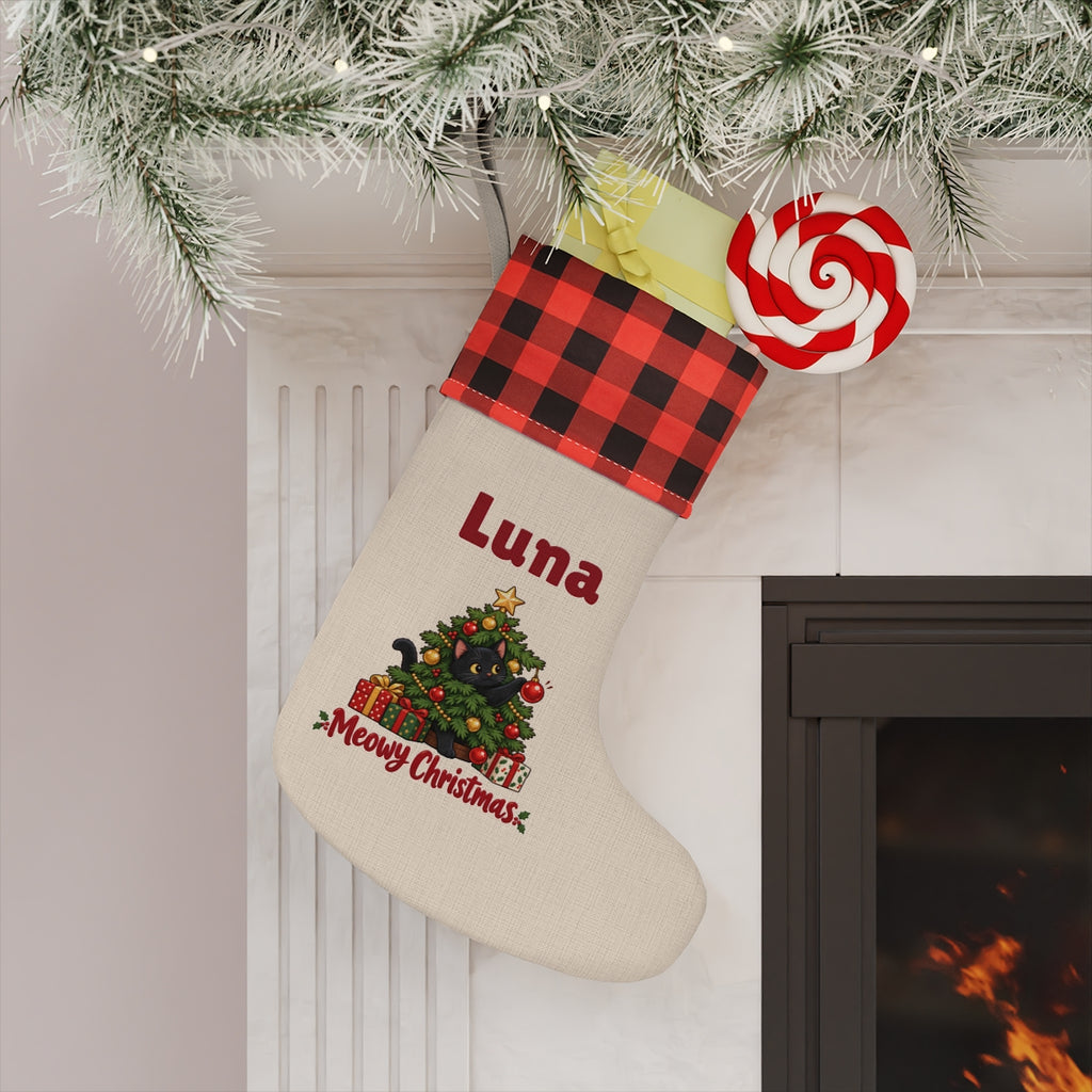 The personalized stocking hanging on a mantel